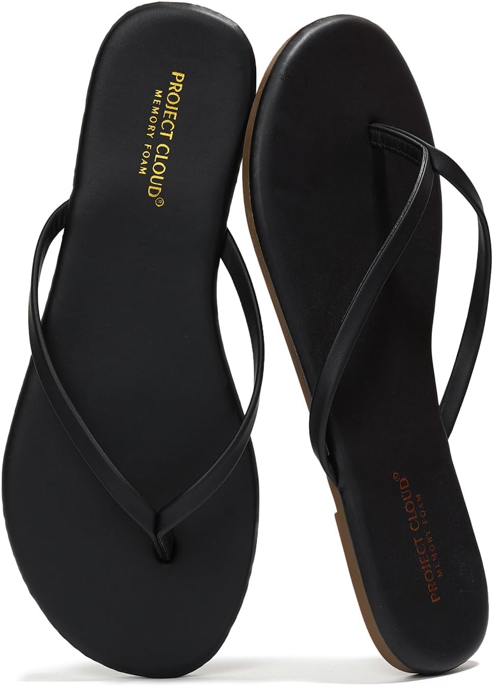 Neutral memory foam flip flops for women with non-slip soles, shown from the side on a sandy beach background โ front
