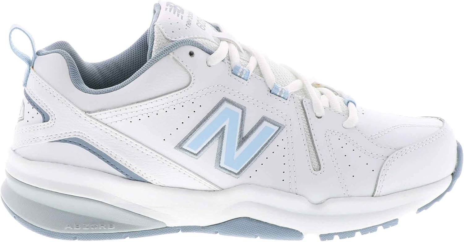 New Balance Women's 608 V5 casual comfort cross trainer in white with navy accents, featuring cushioned midsole and supportive design — view 2
