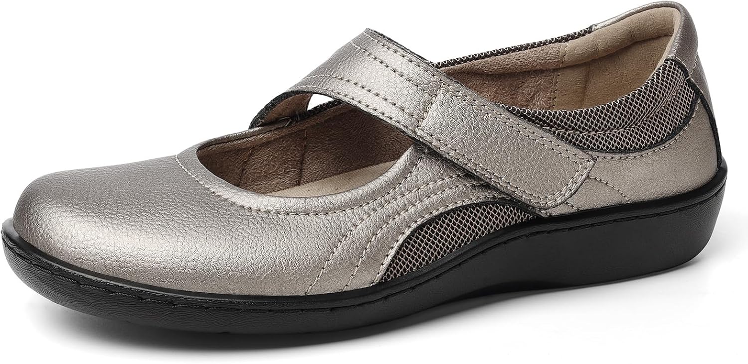 Oviaric women's classic Mary Jane flats in black with closed toe design and slip-on construction, shown from the side on a white background โ view 3