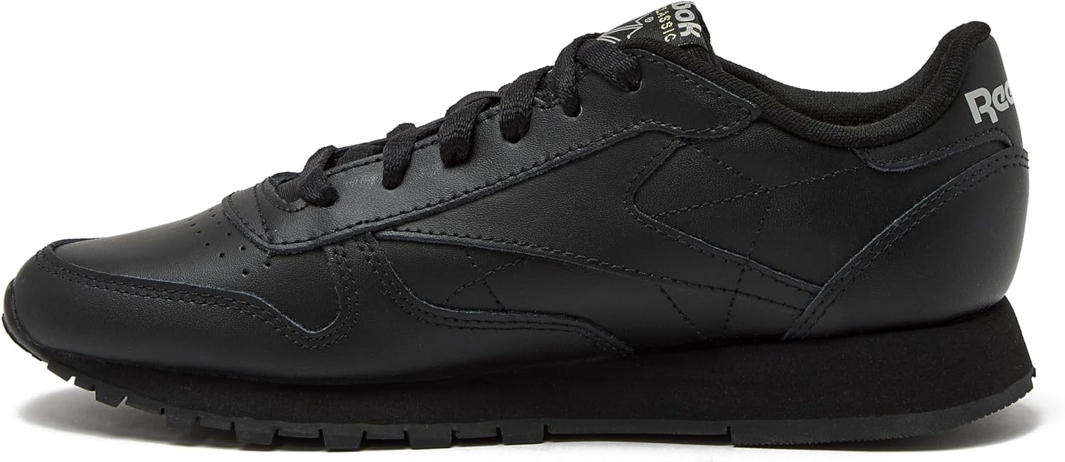 Reebok Classic Leather black sneaker for women displayed on white background, showcasing the iconic tennis shoe silhouette available in women's sizes 5 through 11 โ view 3