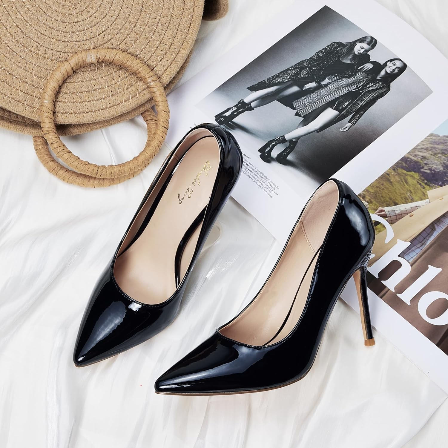 Elisabet Tang women's black closed pointed-toe stiletto pump with 4-inch heel, displayed against neutral background for office and wedding wear — view 3