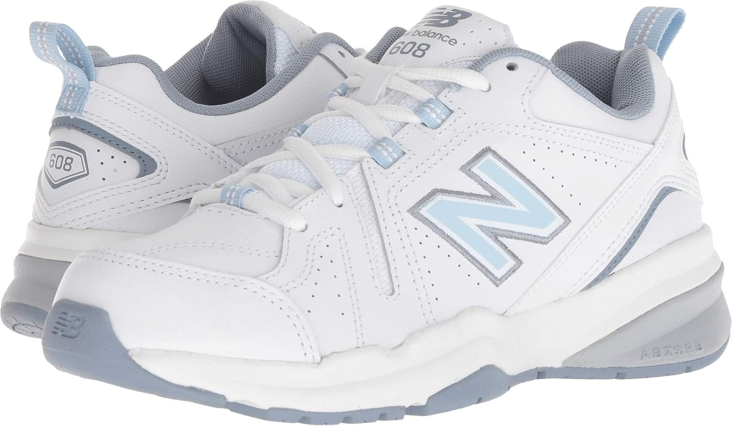 New Balance Women's 608 V5 casual comfort cross trainer in white with navy accents, featuring cushioned midsole and supportive design — view 2