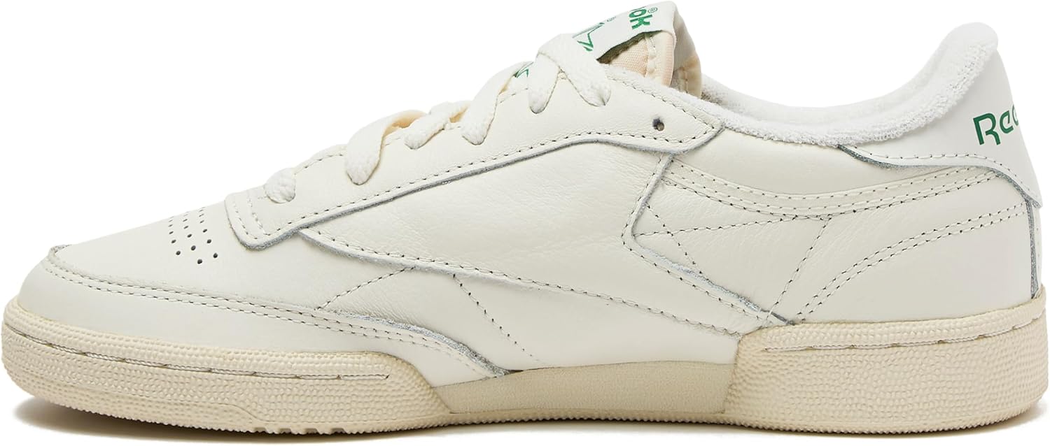 Reebok men's classic leather sneaker in white and navy, featuring the iconic side stripe and cushioned sole for all-day comfort โ view 2