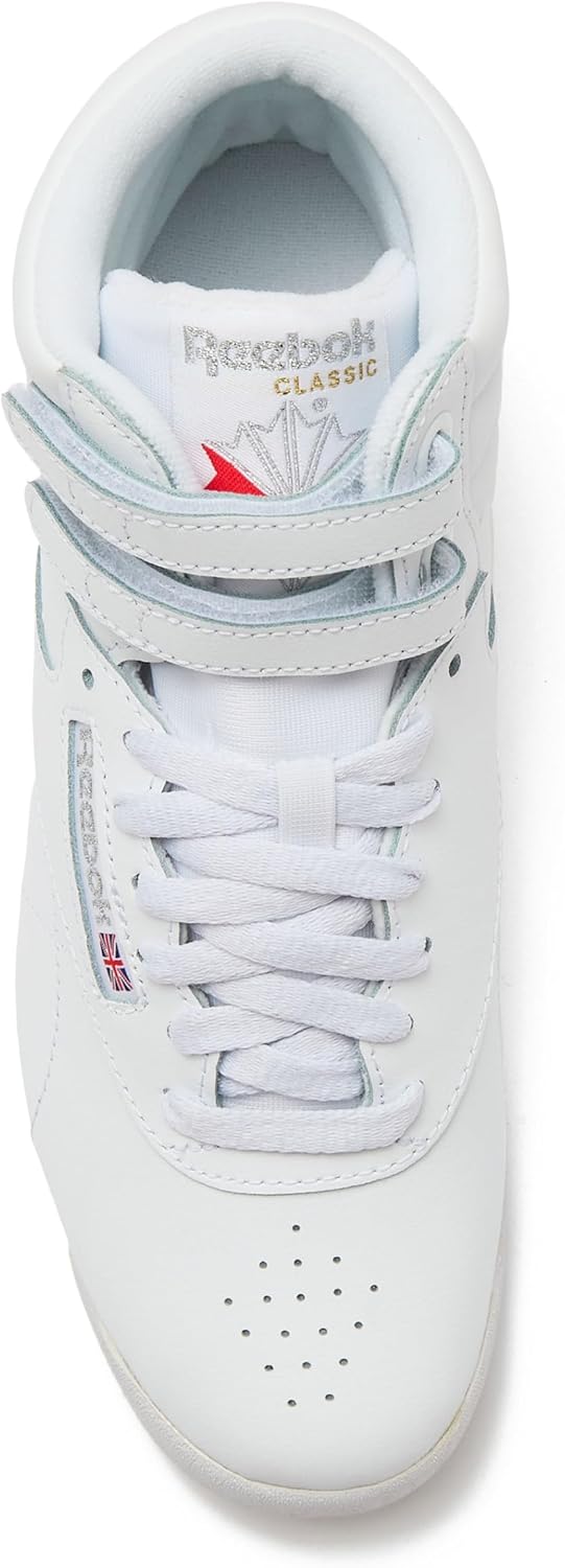 Reebok Women's Freestyle Hi high-top basketball sneaker in white and black colorway, showcasing classic retro silhouette with padded ankle collar and rubber sole โ view 2