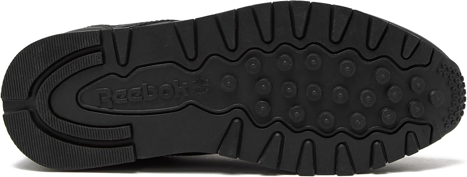 Reebok Classic Leather black sneaker for women displayed on white background, showcasing the iconic tennis shoe silhouette available in women's sizes 5 through 11 โ view 2