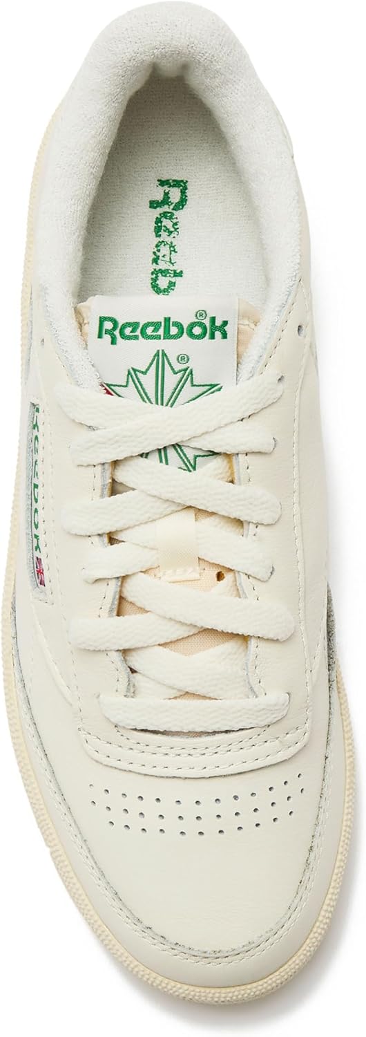 Reebok men's classic leather sneaker in white and navy, featuring the iconic side stripe and cushioned sole for all-day comfort โ view 3