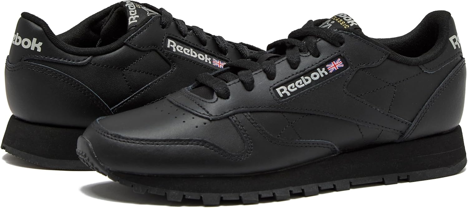 Reebok Classic Leather black sneaker for women displayed on white background, showcasing the iconic tennis shoe silhouette available in women's sizes 5 through 11 โ view 3