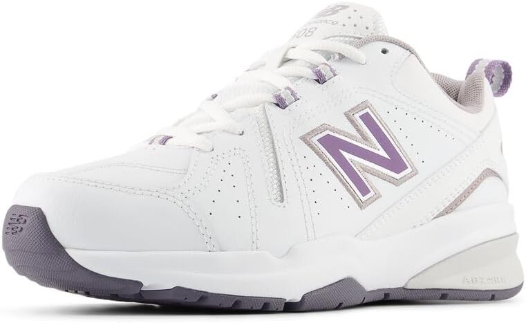 New Balance Women's 608 V5 casual comfort cross trainer in white with navy accents, featuring cushioned midsole and supportive design — view 4