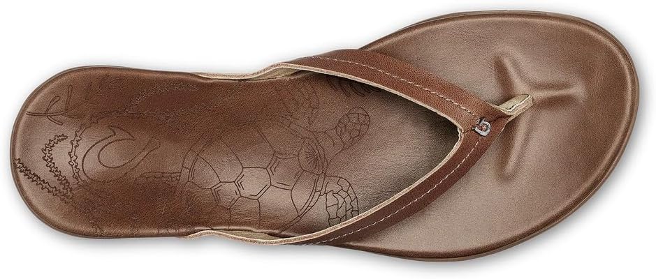 OLUKAI Honu women's beach sandal in tan full-grain leather, featuring a soft slip-on design with cushioned footbed for all-day comfort — view 4