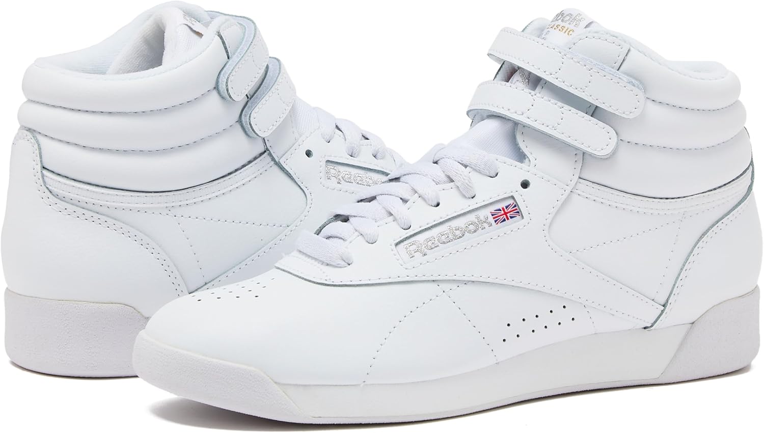 Reebok Women's Freestyle Hi high-top basketball sneaker in white and black colorway, showcasing classic retro silhouette with padded ankle collar and rubber sole โ view 4