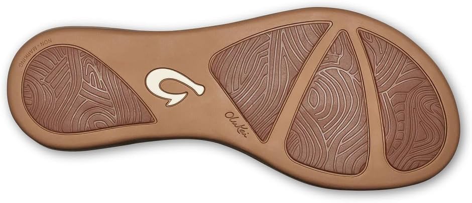 OLUKAI Honu women's beach sandal in tan full-grain leather, featuring a soft slip-on design with cushioned footbed for all-day comfort — view 5