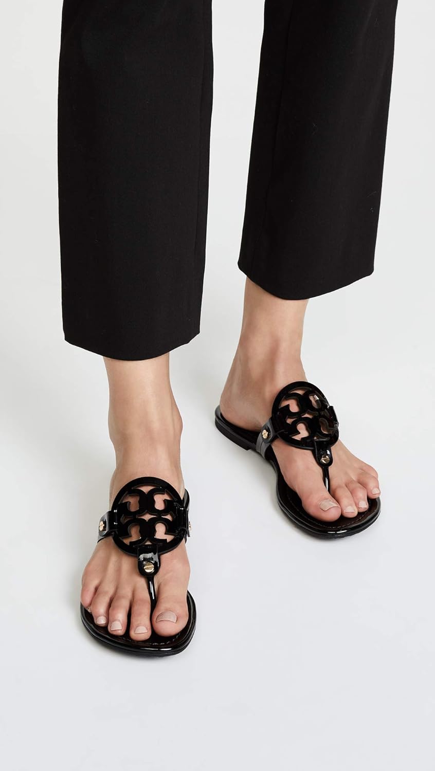 Classic neutral slide sandals with smooth leather upper and cushioned sole, ideal for casual beach and travel wear — view 2