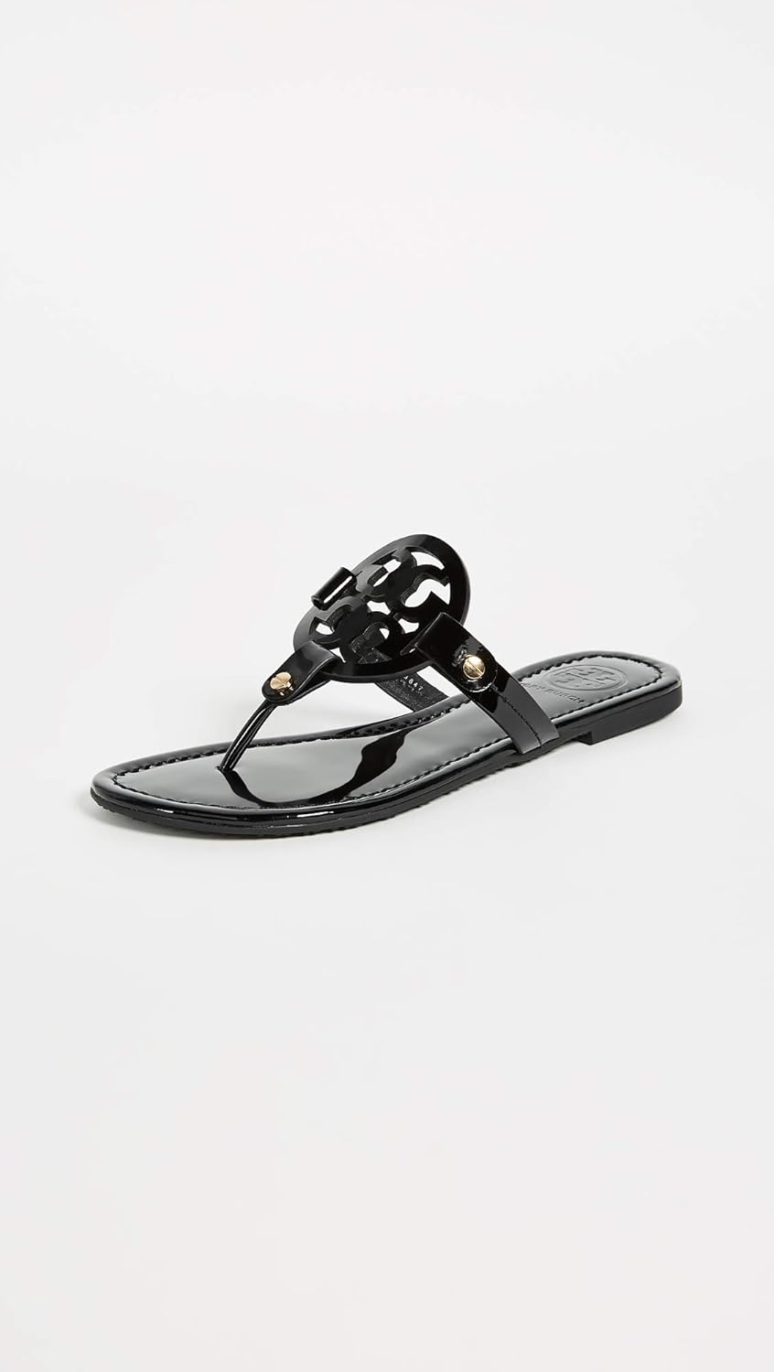 Classic neutral slide sandals with smooth leather upper and cushioned sole, ideal for casual beach and travel wear — view 3