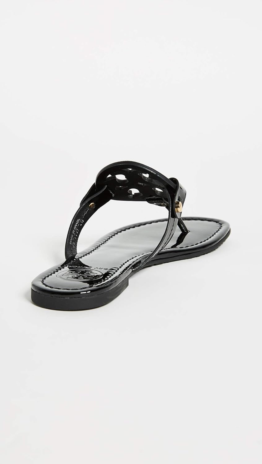 Classic neutral slide sandals with smooth leather upper and cushioned sole, ideal for casual beach and travel wear — view 4
