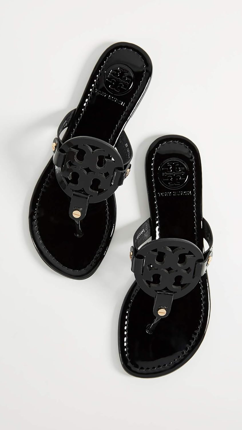 Classic neutral slide sandals with smooth leather upper and cushioned sole, ideal for casual beach and travel wear — view 2