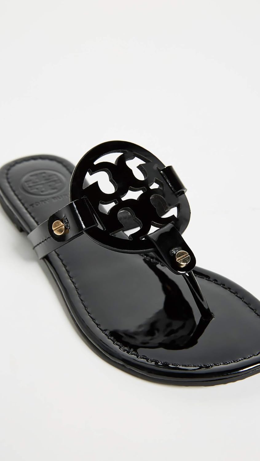 Classic neutral slide sandals with smooth leather upper and cushioned sole, ideal for casual beach and travel wear — view 3