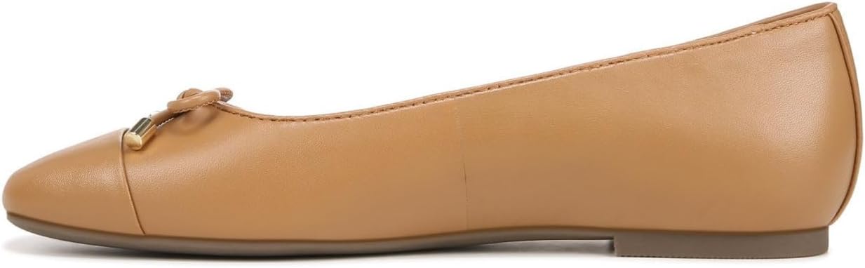 Neutral classic ballet flats with a rounded toe and flexible sole, ideal for casual everyday wear and light dance activities — side