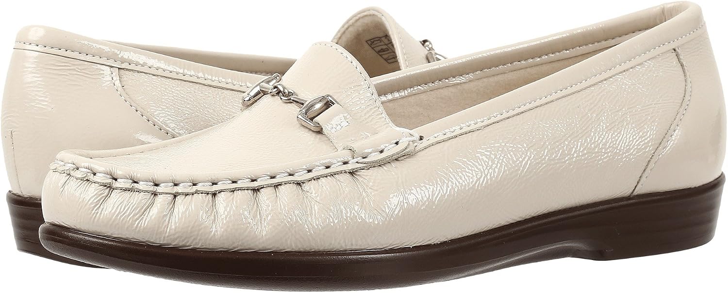 Neutral classic comfort bit loafer with cushioned sole, displayed on a white background — back