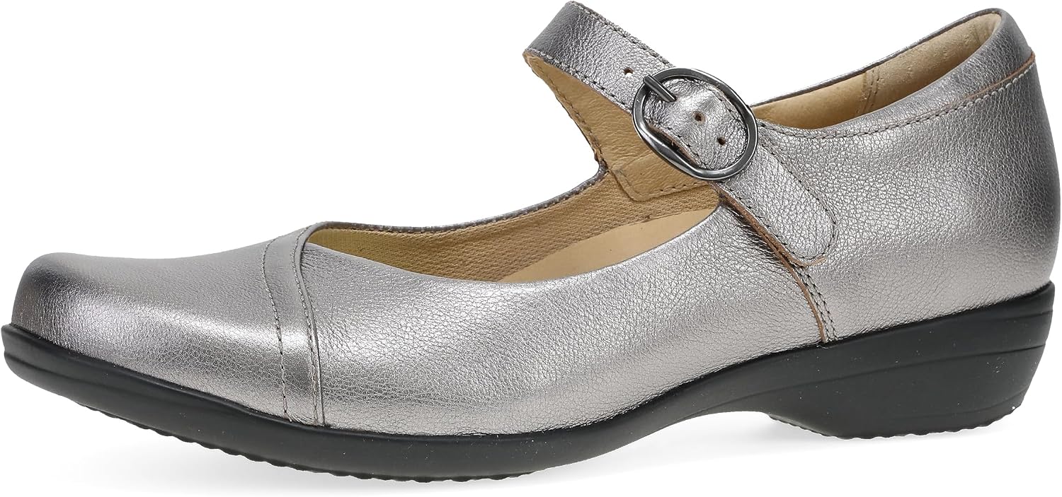 Neutral Mary Jane flat with buckle strap and lightweight rubber outsole, displayed from the side — view 3