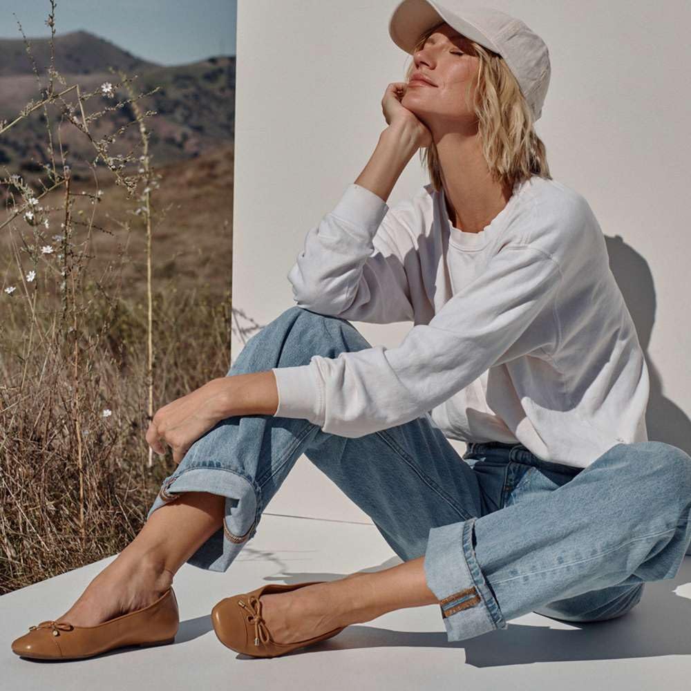 Neutral classic ballet flats with a rounded toe and flexible sole, ideal for casual everyday wear and light dance activities — view 4